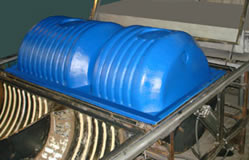 Vacuum-molding machines: <br> forming  of septic tank.